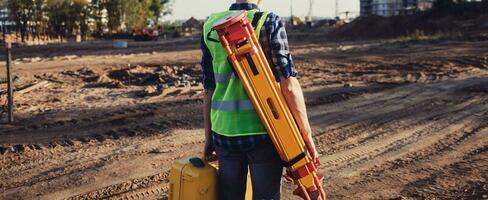 Landvermesser Ingenieur oder Arbeiter foto