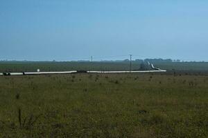 Gas Pipeline Konstruktion, la Pampa Provinz , Patagonien, Argentinien. foto