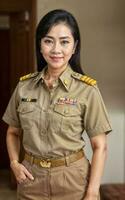 Foto von Mitte alt asiatisch Frau im thailändisch Lehrer Uniform, generativ ai