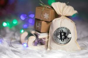 Winter Ferien Hintergrund das Sack mit Bitcoins. foto