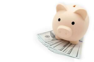Schweinchen Bank auf Dollar. Geschäft, Finanzen, Investition, Speichern und Korruption Konzept. foto