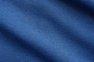 Blau Sport Kleidung Stoff Fußball Hemd Jersey Textur foto