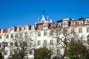 das historisch Gebäude um König pedro iv Platz ebenfalls namens Rossio Platz gelegen im das Pombalin Innenstadt von Lissabon foto