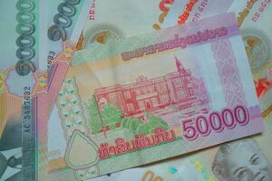 laos kip banknoten nahaufnahme. Geld Hintergrund. Laos-Währung - Kip. mustertextur und hintergrund von laos kip geld, währungsbanknoten, die zum umtausch bereit sind, und geschäftsinvestitionen. foto
