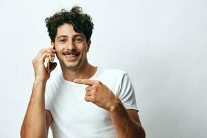 halten Mann Weiß Botschaft Lebensstil online Technologie Telefon Porträt T-Shirt Hipster foto