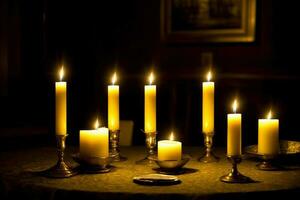 ein Gruppe von zündete Kerzen Sitzung auf oben von ein Tisch. ai generiert foto