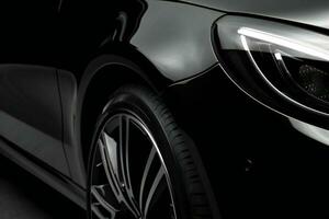 schwarz Sport Auto Nahansicht auf dunkel Hintergrund. 3d Wiedergabe. ai generativ foto
