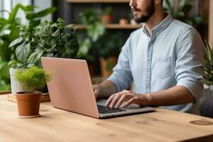 jung Mann funktioniert beim ein Computer im das Büro. Freiberufler Arbeiten von ein Laptop. Geschäft, Bildung Konzept. generativ ai foto