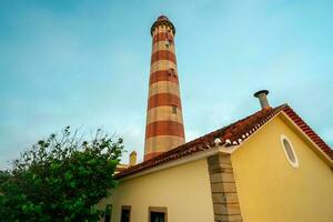 Farol de aveiro. Leuchtturm im das Küste von aveiro, Portugal. foto