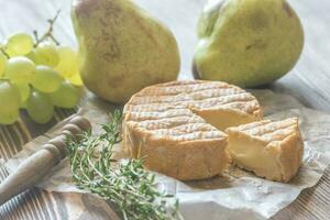 Roucoulons Käse mit Birne und Traube foto