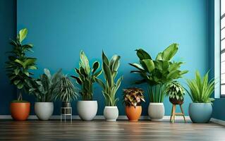 das Innen- eingetopft Pflanzen Dekoration im modern Zimmer mit ein hölzern Fußboden und Blau Mauer. foto