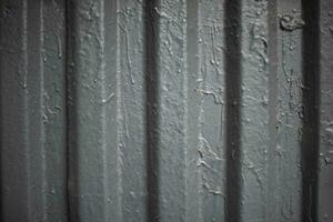 grau Farbe auf Zaun. dick Mantel von malen. Stahl Oberfläche. foto