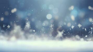 blauer weihnachtshintergrund mit schneeflocken foto