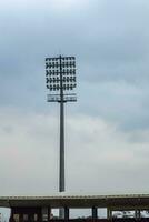 Kricket Stadion Flut Beleuchtung Stangen beim Delhi, Indien, Kricket Stadion Beleuchtung foto