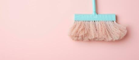 Foto von ein bunt Staub Bürste hängend auf ein beschwingt Rosa Mauer mit viel von Kopieren Raum mit Kopieren Raum