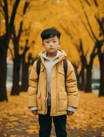 asiatisch Kind im emotional dynamisch Pose auf Herbst Hintergrund ai generativ foto