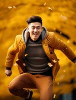 Foto von emotional dynamisch Pose asiatisch Mann im Herbst ai generativ