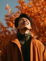 Foto von emotional dynamisch Pose asiatisch Mann im Herbst ai generativ