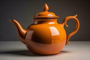 Orange Keramik Teekanne auf ein grau Hintergrund. generativ ai foto