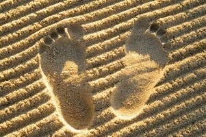 Fußabdrücke im Sand foto