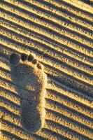 Fußabdrücke im Sand foto