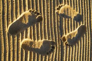 Fußabdrücke im Sand foto