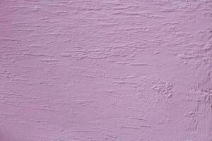 abstrakt Rosa Stuck Grunge texturiert Hintergrund. Mauer ist fertig mit dekorativ Zement Gips. gegenüber. Kopieren Raum foto
