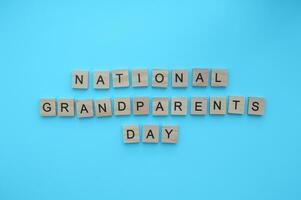 September 10, National Großeltern Tag, minimalistisch Banner mit das Inschrift im hölzern Briefe foto