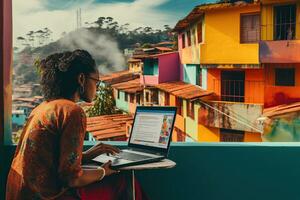 ein Frau Sitzung auf ein Balkon mit ein Laptop foto