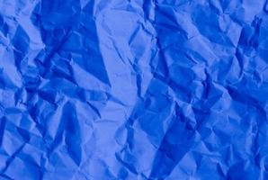 zerknittertes blaues Papier, toller Hintergrund für Webseiten, Collagen, Layouts foto
