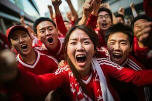 japanisch Fußball Fans feiern ein Sieg foto