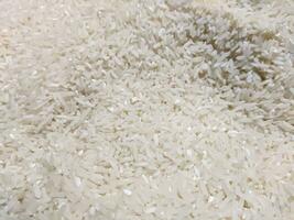 schließen oben von ungekocht Weiß Reis Körner foto