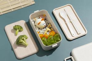 Draufsicht Zusammensetzung Essen japanische Bento Box foto