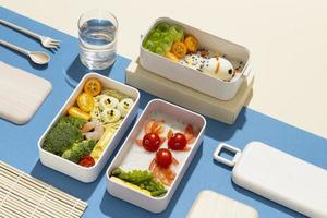 Draufsicht Zusammensetzung Essen japanische Bento Box foto