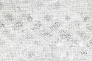Nahansicht von ein Weiß hölzern Panel Hintergrund mit geometrisch druckt foto