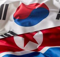 Norden und Süd Korea Flagge. bunt Süd und Norden Korea Flagge winken im das Wind foto