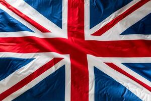 Nahansicht von Union Jack Flagge. Vereinigtes Königreich Flagge. britisch Union Jack Flagge weht im das Wind foto