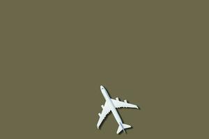 Modell- Flugzeug, Flugzeug auf Grün Farbe Hintergrund. foto