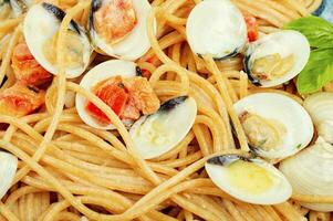 Gericht von Spaghetti mit Venusmuscheln, Makro. foto