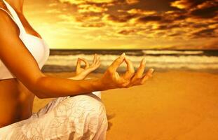 Yoga Meditation auf das Strand foto