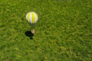 fliegend heiße Luft Ballon Über das Gras Feld, 3d Wiedergabe. foto