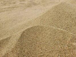 Hintergrund von Sand Dünen. Sand auf das Strand. foto