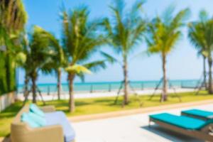 abstrakte Unschärfe und defokussiertes Outdoor-Restaurant am Strand und Meer foto