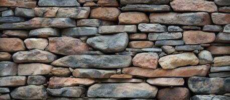 Hintergrund von ein Stein Mauer gemacht von natürlich Felsen foto