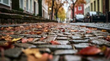 ein Kopfsteinpflaster Straße mit Blätter auf das Boden generativ ai foto