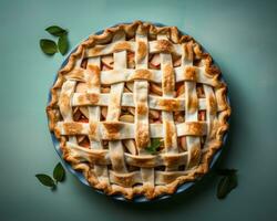 ein Apfel Kuchen mit Gitter auf ein Blau Hintergrund generativ ai foto