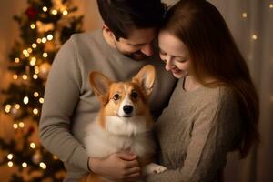 Porträt von Mann und Frau umarmen süß Corgi Hund. Haustier Konzept foto