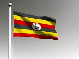 Uganda National Flagge winken auf grau Hintergrund foto