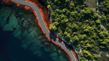 generativ ai, Antenne Aussicht von gebogen Asphalt Straße in der Nähe von das Ozean oder Meer, Küste foto