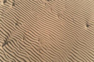 Wüste Sand Textur mit Linie Muster, oben Aussicht foto